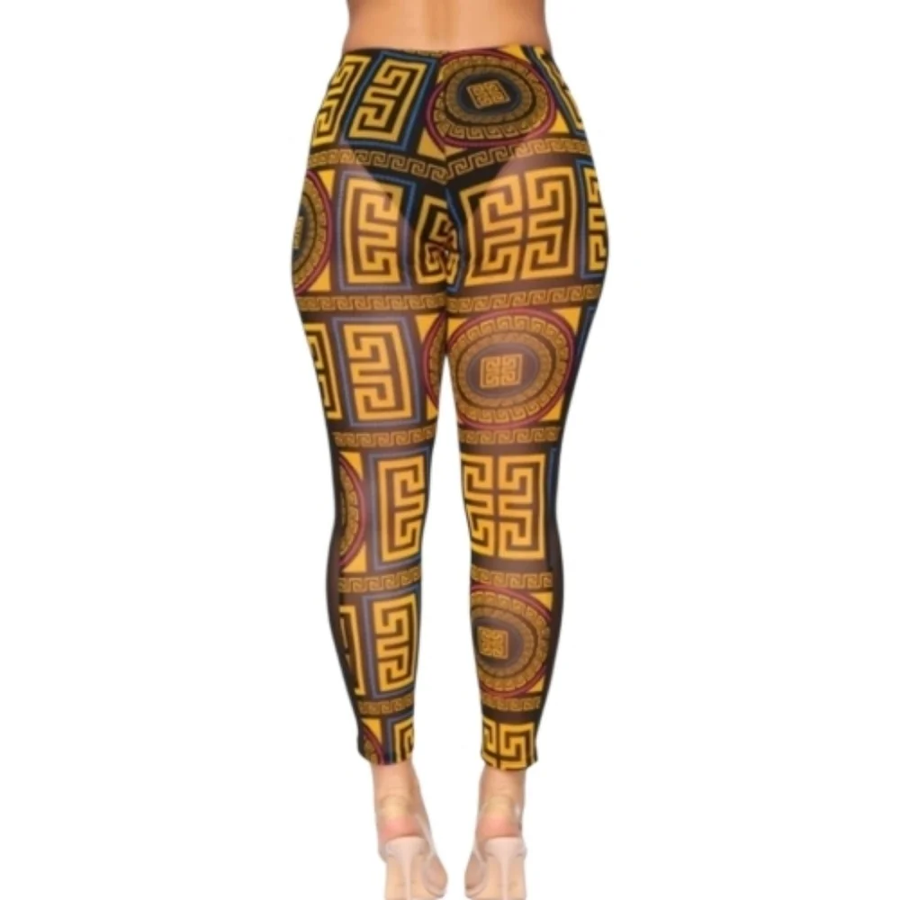 Fashion Nova Black and Gold Geometric Mesh Leggings. Size M.